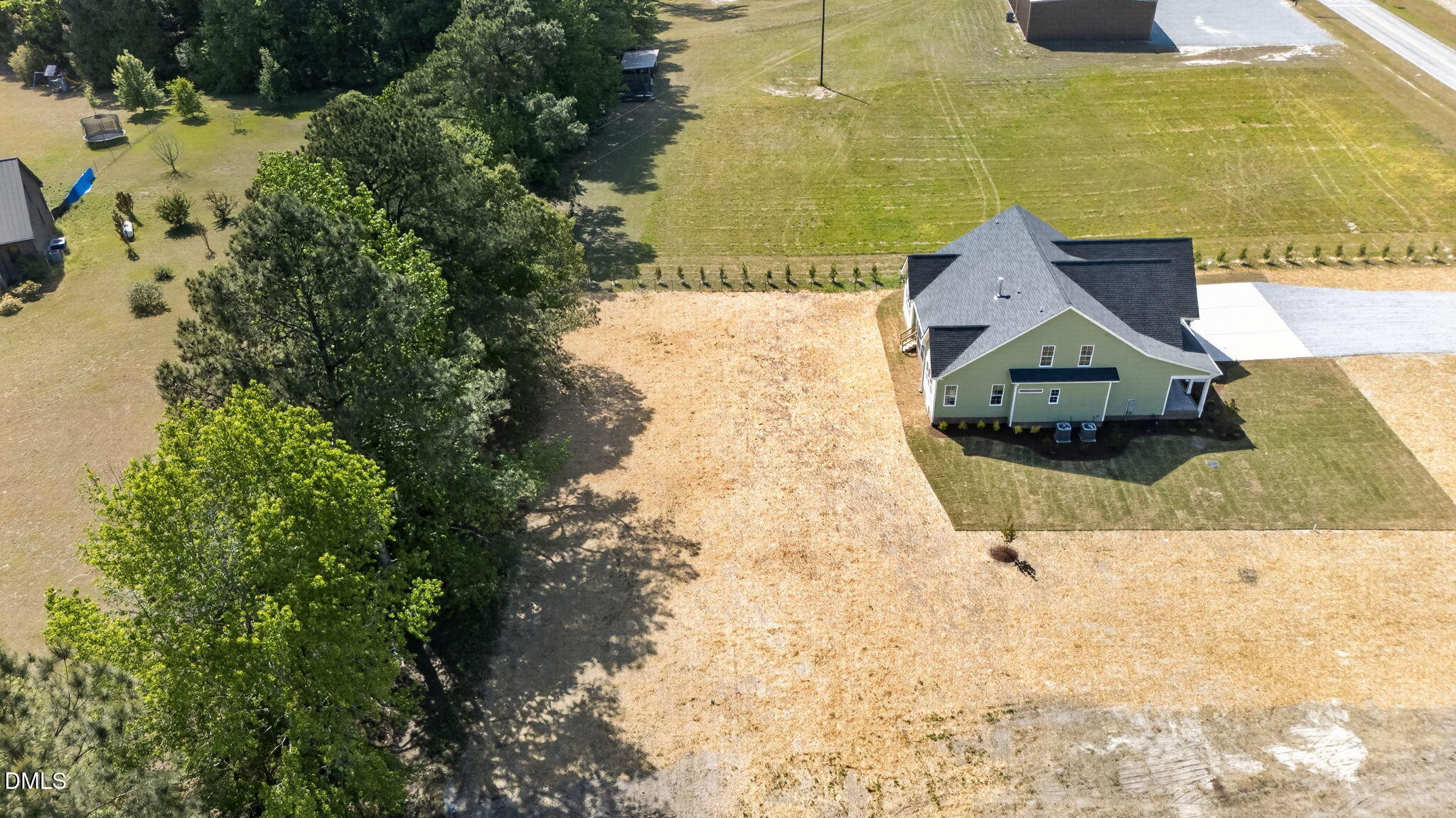 651 Dixon Road, Unit (LOT 2A) Willow Spring, NC 27592 - Photo 73 of 77 a aerial view of a house with a yard