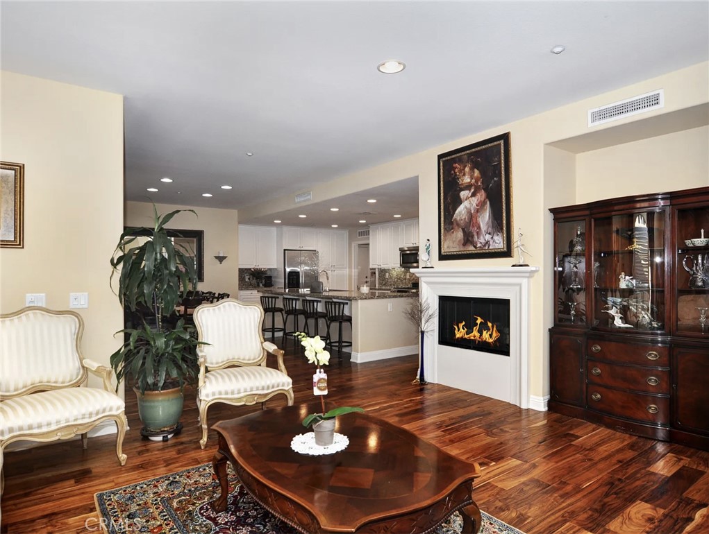 135 Pathway Irvine, CA 92618 - Photo 6 of 12 a living room with furniture and a fireplace