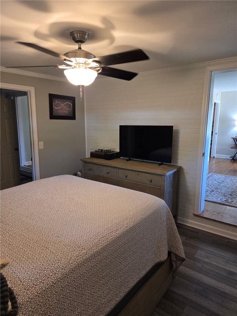 103 Elm Avenue Anderson, SC 29625 - Photo 12 of 19 This restful bedroom offers a spacious retreat with elegant wood flooring and a refreshing ceiling fan.