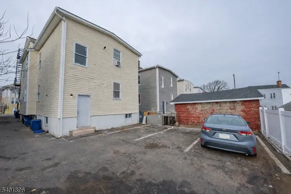 a car parked in front of a house