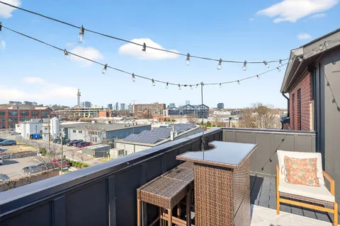 a kitchen with a sink and a stove