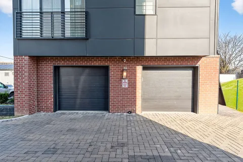 a view of a house with a garden