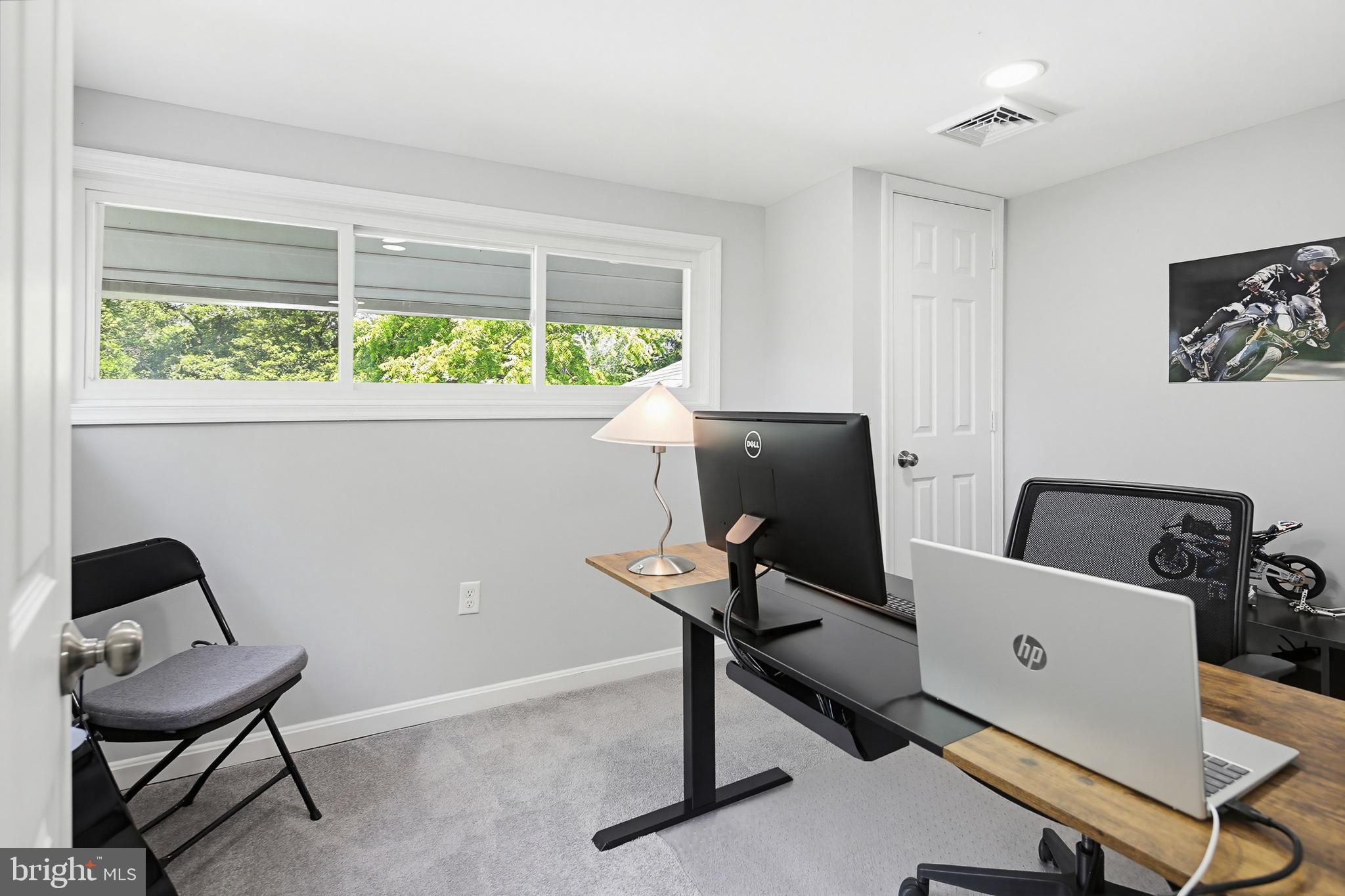 4311 Powder Mill Road Beltsville, MD 20705 - Photo 39 of 71 Upper level bedroom with lots of natural light.