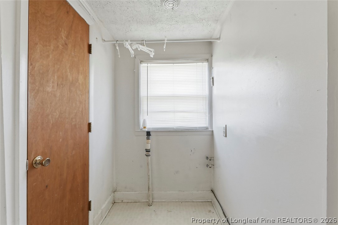 249 Nicholson Road Rockingham, NC 28379 - Photo 25 of 47 a bathroom with a glass shower door
