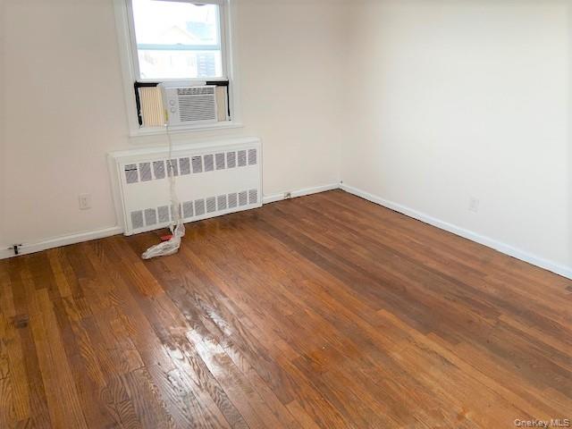 77 Kentucky Street, Unit UPPR Long Beach, NY 11561 - Photo 9 of 15 a view of an empty room and window