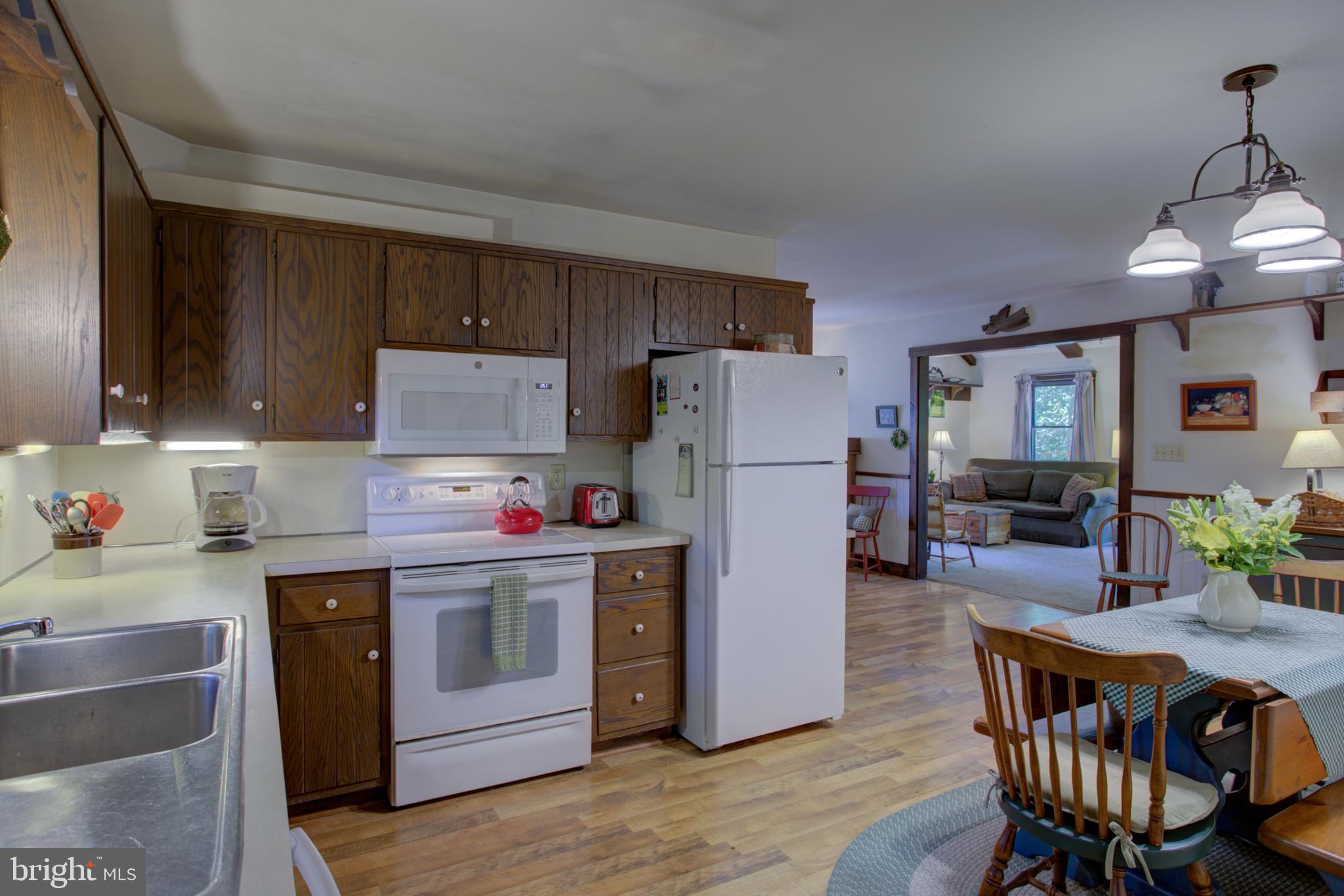 3091 Back Run Road Manheim, PA 17545 - Photo 4 of 40 Open floor plan with wood laminate floors.