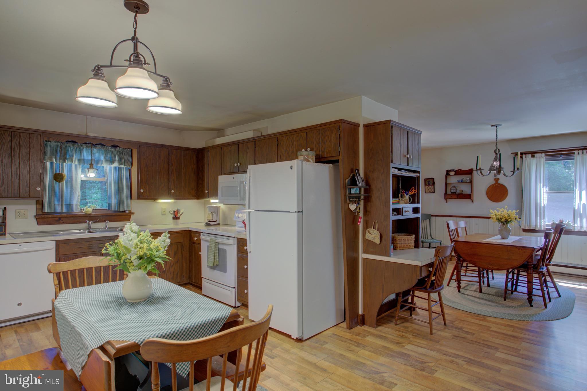 3091 Back Run Road Manheim, PA 17545 - Photo 6 of 40 Eat in kitchen open to dining room.