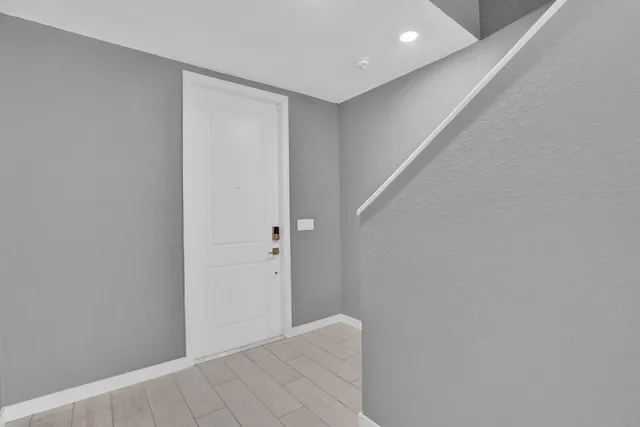 a view of hallway with closet