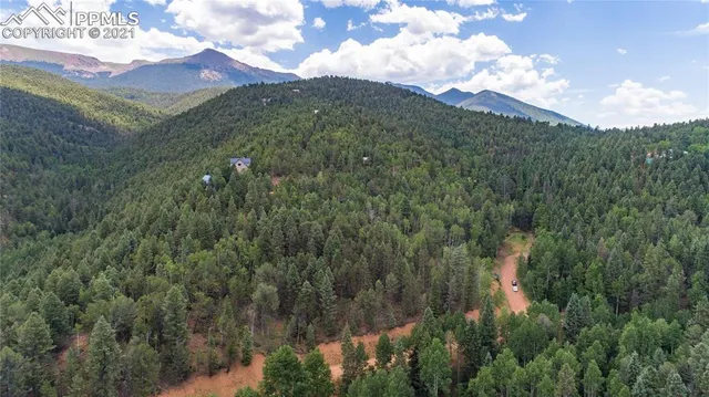 a view of a house with a street
