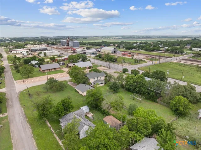 a view of city with ocean