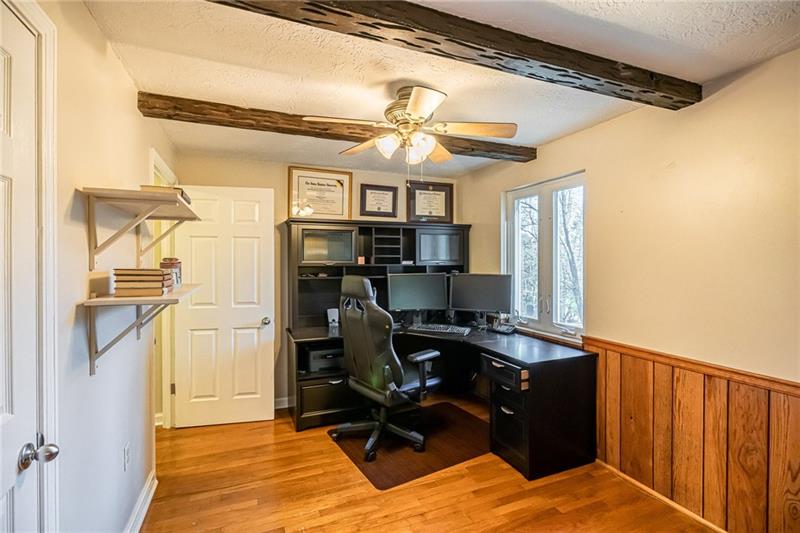 105 Deer Road Pittsburgh, PA 15237 - Photo 11 of 25 This main level den space is perfect for a home office, library, sitting area or play room.