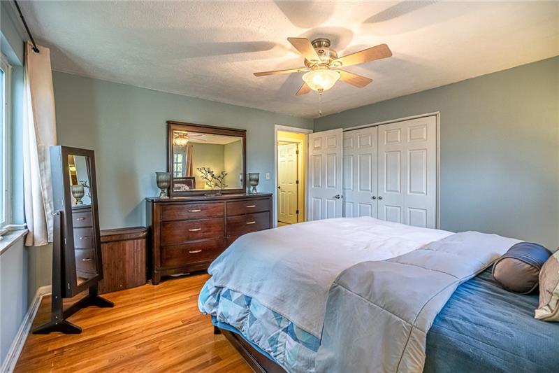 105 Deer Road Pittsburgh, PA 15237 - Photo 13 of 25 The first floor master bedroom with flowing hardwood floors is well appreciated.