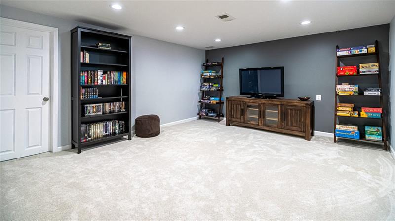 105 Deer Road Pittsburgh, PA 15237 - Photo 16 of 25 The basement had a complete remodel in 2017. New carpet, recessed lighting and more were done to make a desirable game room.