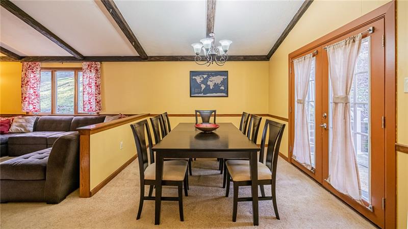 105 Deer Road Pittsburgh, PA 15237 - Photo 9 of 25 A designated dining area is large enough for a large table. French doors lead to the side deck.