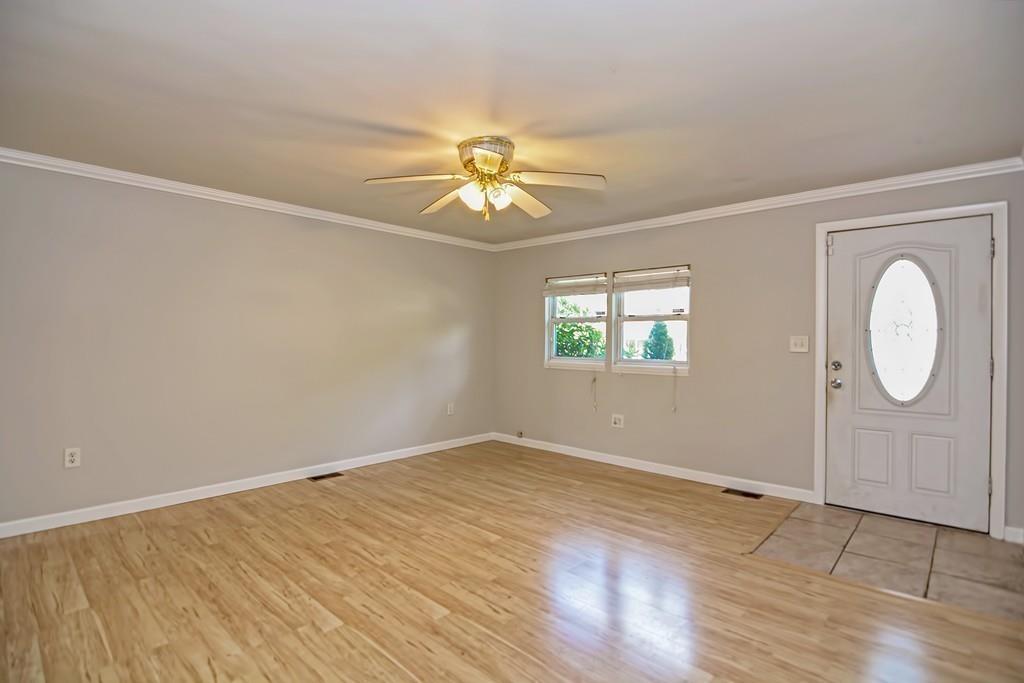 50 Evergreen Road Norton, MA 02766 - Photo 8 of 29 wooden floor in an empty room with a window