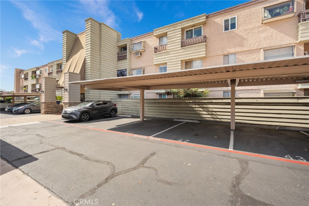 3142 Midway Drive, Unit B307 San Diego, CA 92110 - Photo 15 of 17 a view of a street with a building