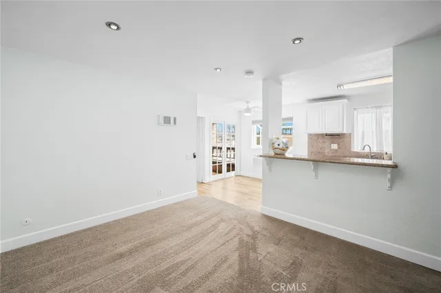 a view of kitchen with wooden floor