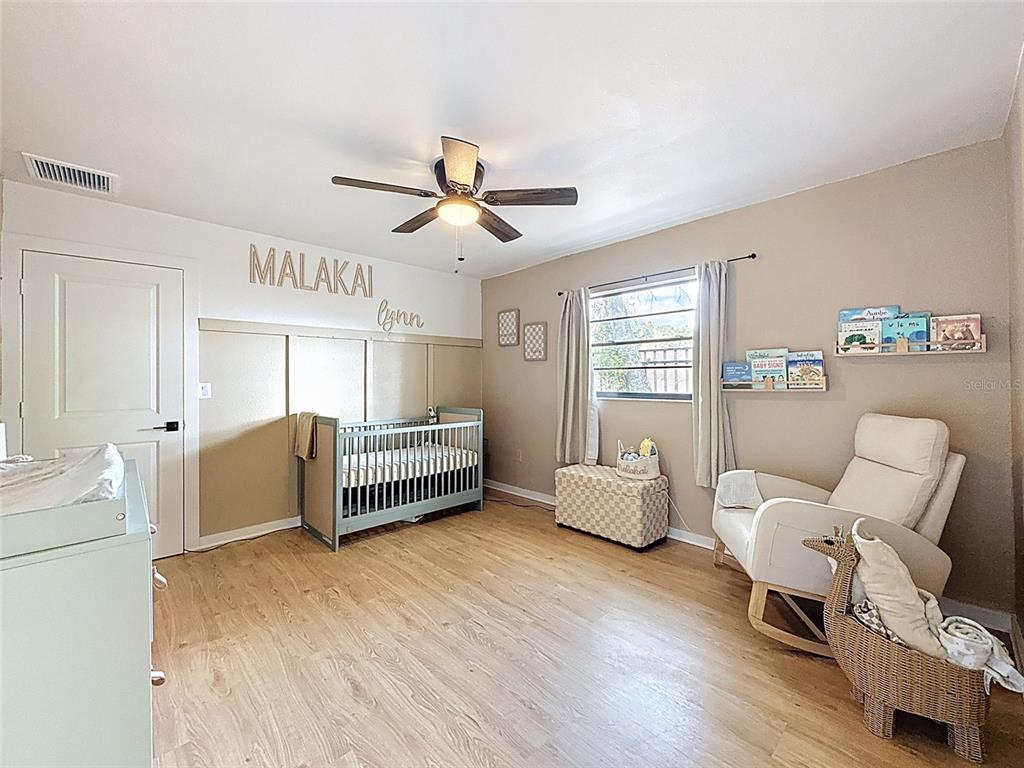 1652 Larkin Road Spring Hill, FL 34608 - Photo 16 of 29 a living room with furniture and windows