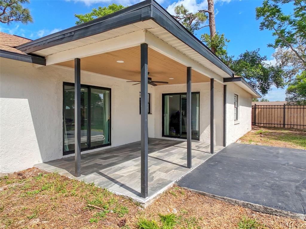 1652 Larkin Road Spring Hill, FL 34608 - Photo 24 of 29 a view of a house with backyard