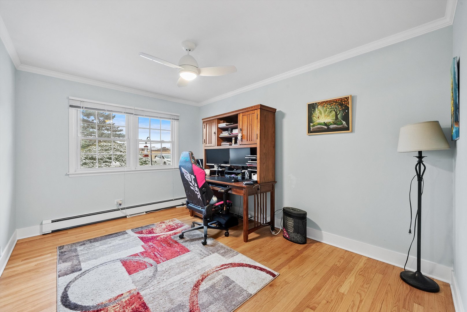 2920 Quentin Road Rolling Meadows, IL 60008 - Photo 18 of 30 a view of a workspace with furniture and a window