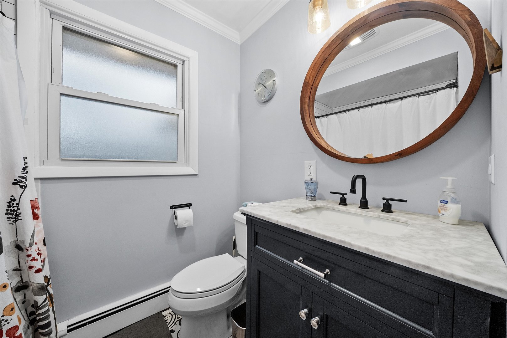 2920 Quentin Road Rolling Meadows, IL 60008 - Photo 19 of 30 a bathroom with a granite countertop toilet sink and mirror