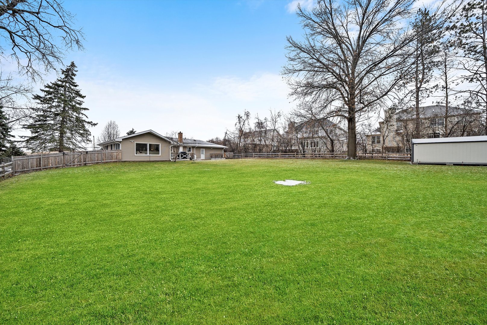 2920 Quentin Road Rolling Meadows, IL 60008 - Photo 20 of 30 a view of a green field with house in the background