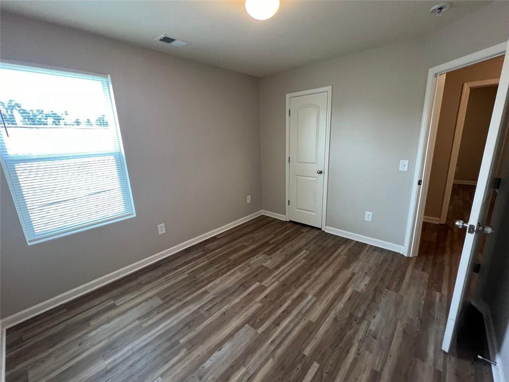 34 Luwanda Trail Cartersville, GA 30120 - Photo 24 of 30 a view of a room with wooden floor and window