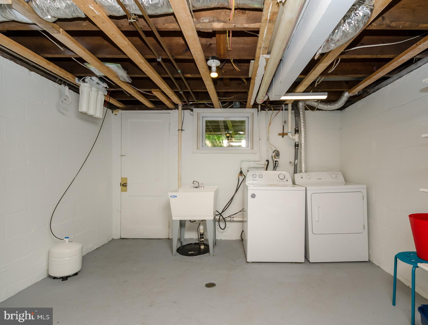 5509 Taylor Road Riverdale, MD 20737 - Photo 35 of 40 Unfinished Section w/Laundry- New Washer