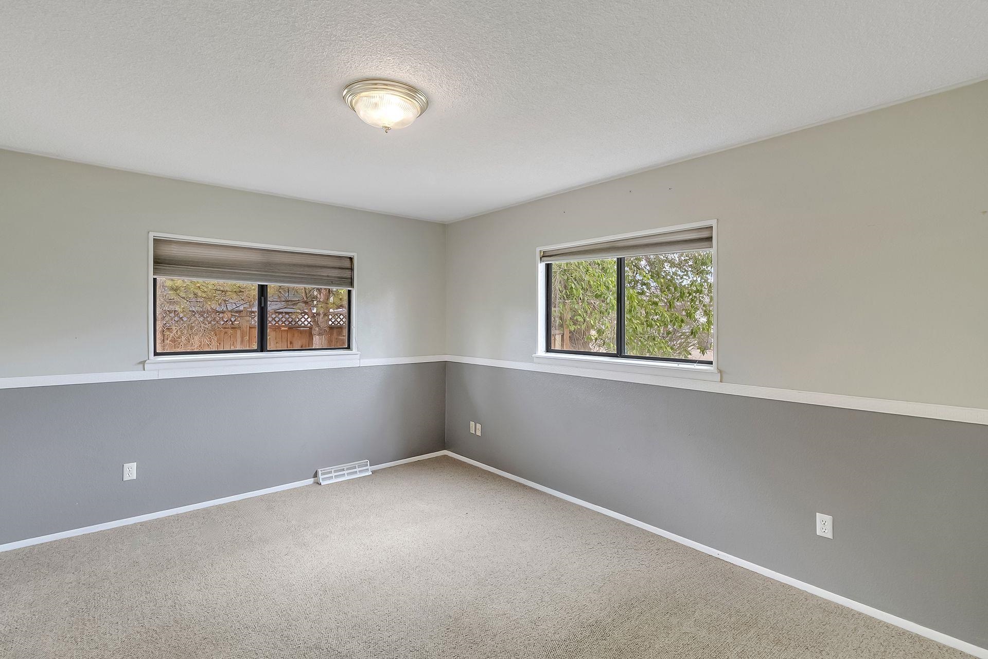 483-30 C 3/4 Road Grand Junction, CO 81504 - Photo 12 of 25 an empty room with windows and closet