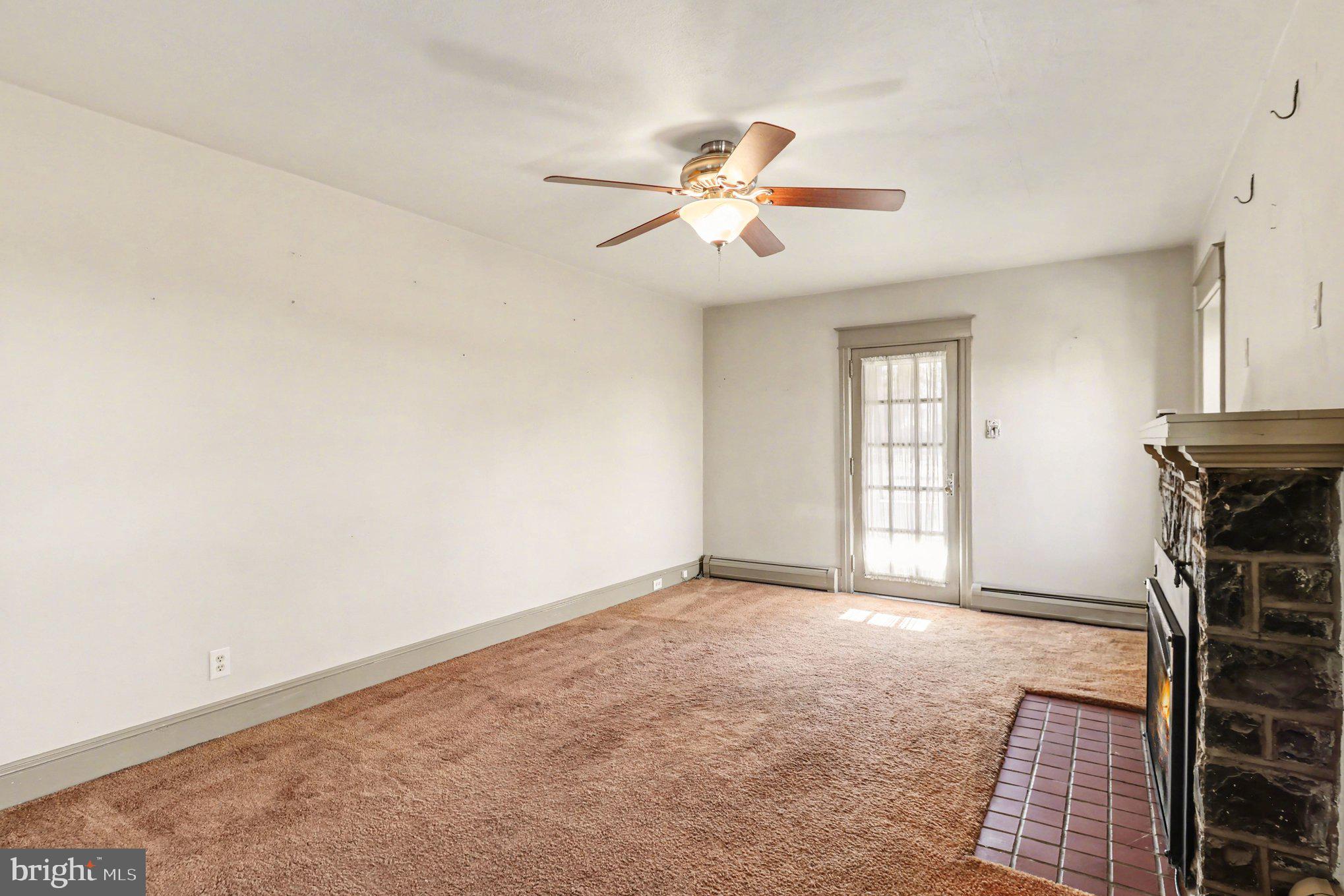 3159 Bristol Road Doylestown, PA 18901 - Photo 12 of 40 an empty room with windows and fan