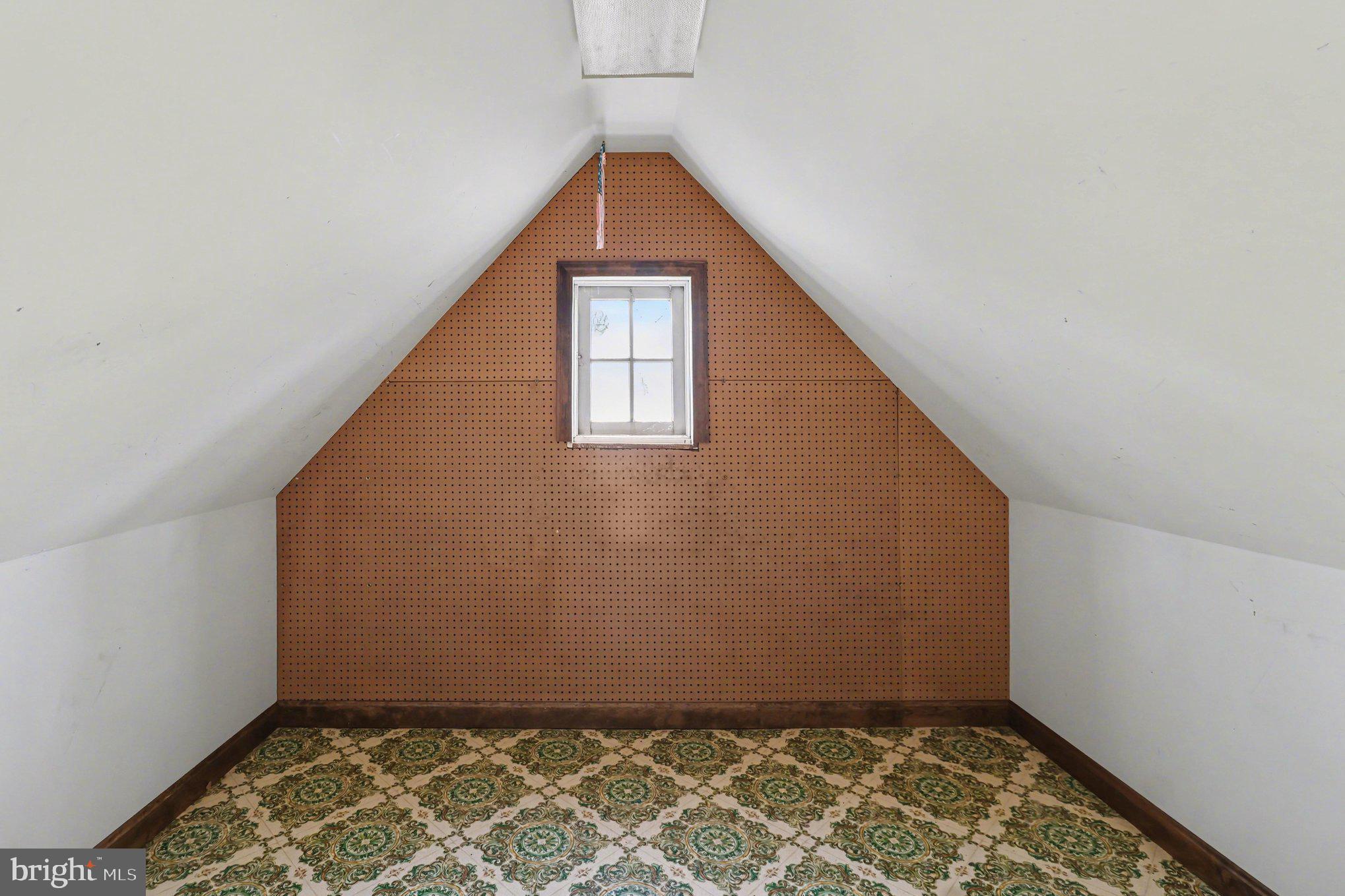 3159 Bristol Road Doylestown, PA 18901 - Photo 18 of 40 an empty room with wooden floor and a window