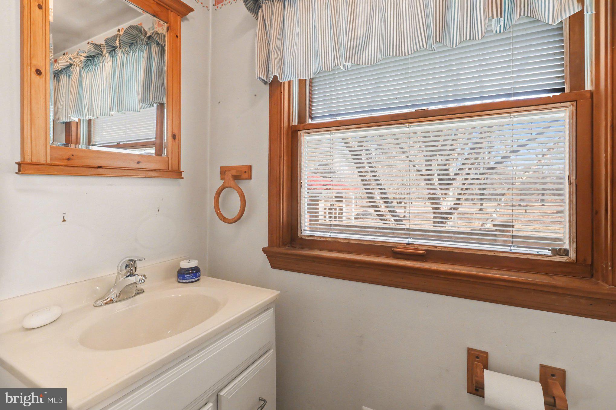 3159 Bristol Road Doylestown, PA 18901 - Photo 22 of 40 a bathroom with a sink and a window