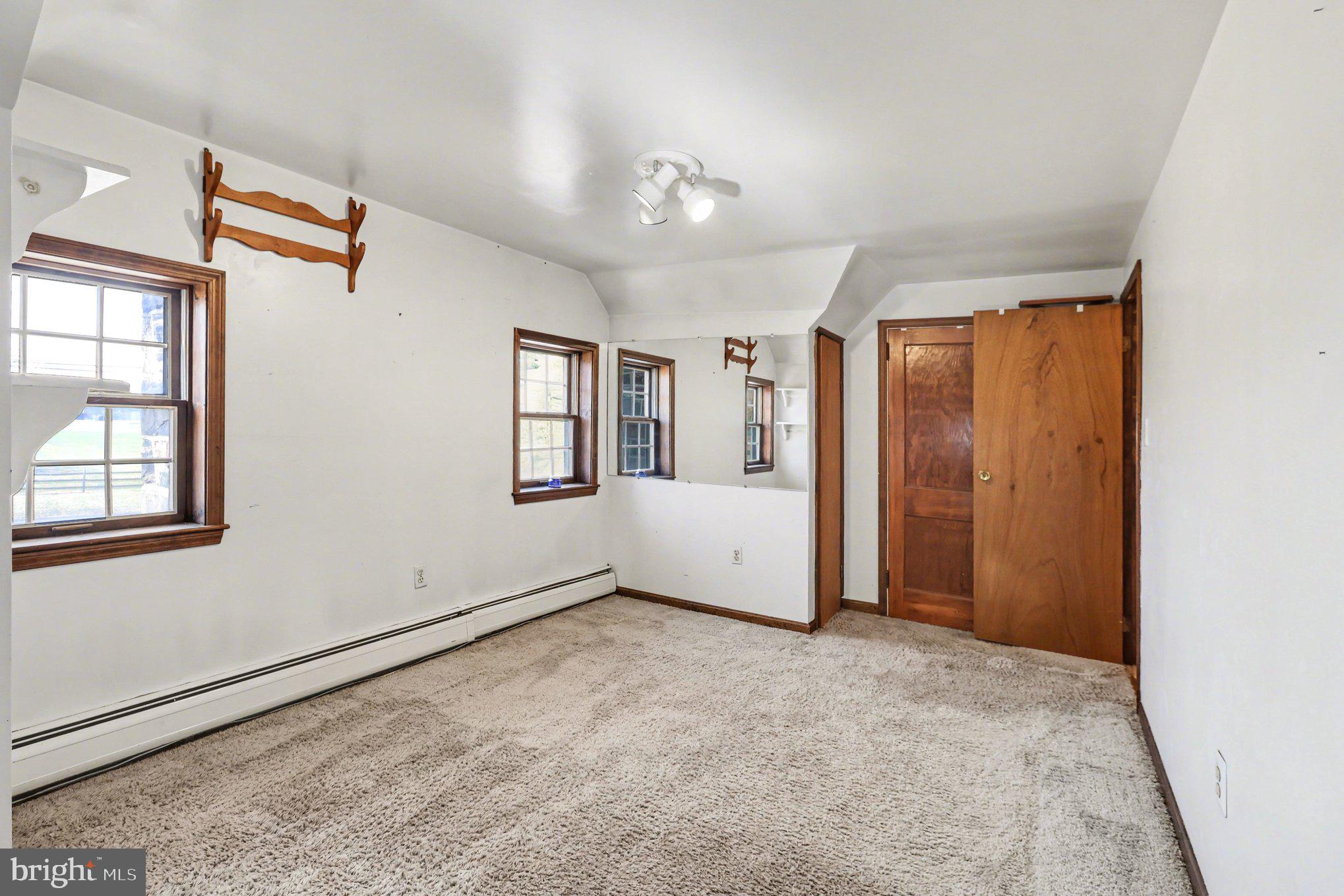 3159 Bristol Road Doylestown, PA 18901 - Photo 28 of 40 an empty room with windows and closet