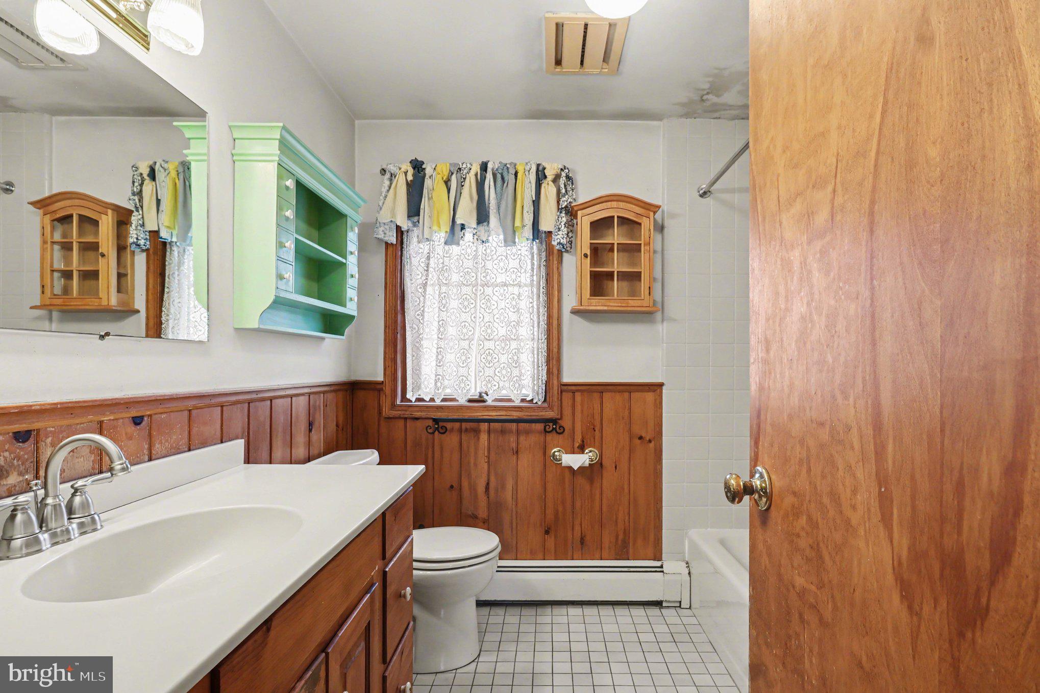 3159 Bristol Road Doylestown, PA 18901 - Photo 29 of 40 a bathroom with a sink a toilet and shower