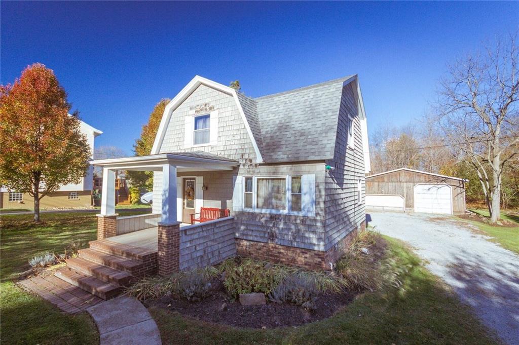 2022 Darlington Road Beaver Falls, PA 15010 - Photo 1 of 20 LOVELY CURVED SIDEWALK TO COVERED FRONT PORCH AT MAIN ENTRANCE