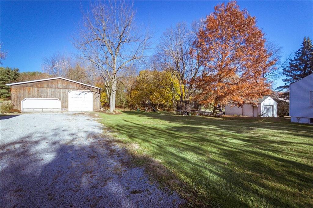 2022 Darlington Road Beaver Falls, PA 15010 - Photo 2 of 20 LONG GRAVEL DRIVEWAY BACK TO HUGE DETACHED GARAGE