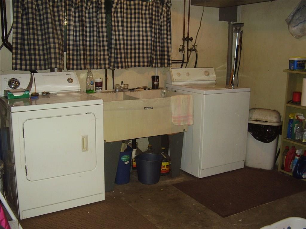 2022 Darlington Road Beaver Falls, PA 15010 - Photo 14 of 20 LAUNDRY AREA IN BASEMENT. WASHER AND DRYER CAN STAY.