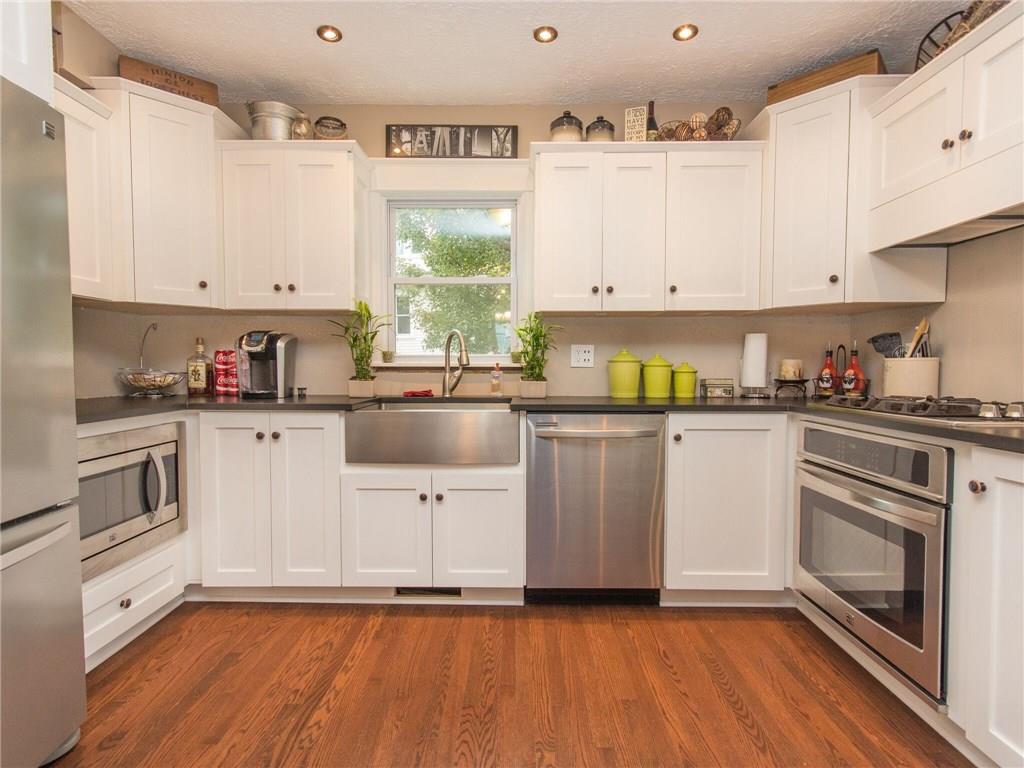 2022 Darlington Road Beaver Falls, PA 15010 - Photo 6 of 20 JUST LOOK AT THIS WELL-APPOINTED KITCHEN WITH ALL STAINLESS STEEL APPLIANCES AND FARMHOUSE SINGLE BOWL SINK!