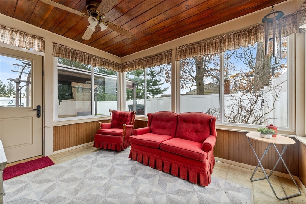 430 Amostown Road West Springfield, MA 01089 - Photo 16 of 41 a living room with furniture and a large window