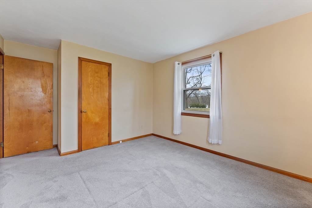 430 Amostown Road West Springfield, MA 01089 - Photo 19 of 41 a view of an empty room with window