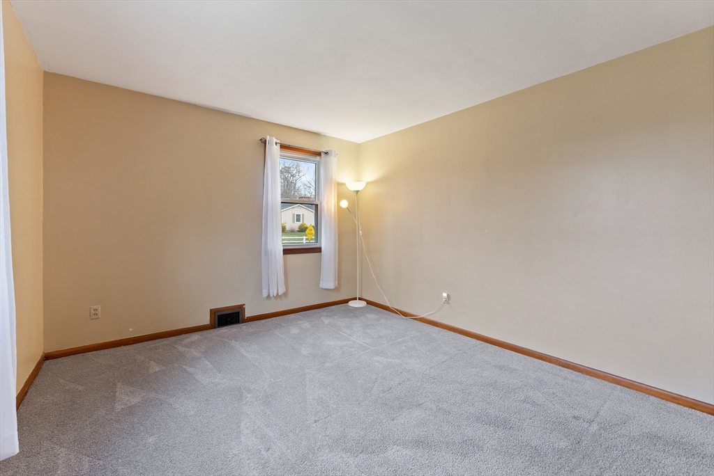 430 Amostown Road West Springfield, MA 01089 - Photo 20 of 41 a view of an empty room and window