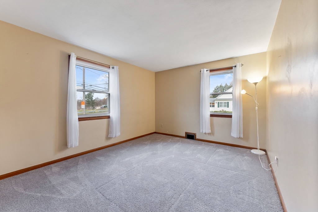 430 Amostown Road West Springfield, MA 01089 - Photo 21 of 41 an empty room with windows