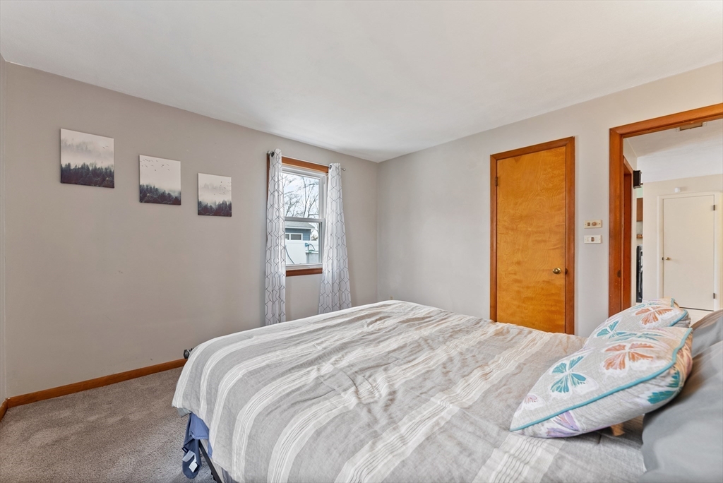 430 Amostown Road West Springfield, MA 01089 - Photo 24 of 41 a bedroom with a bed and a window