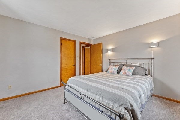 430 Amostown Road West Springfield, MA 01089 - Photo 25 of 41 a bedroom with a bed and a window