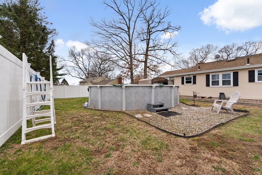 430 Amostown Road West Springfield, MA 01089 - Photo 33 of 41 a view of a house with backyard and snow