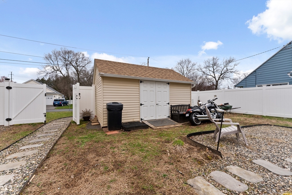 430 Amostown Road West Springfield, MA 01089 - Photo 36 of 41 a view of a house with backyard and sitting area