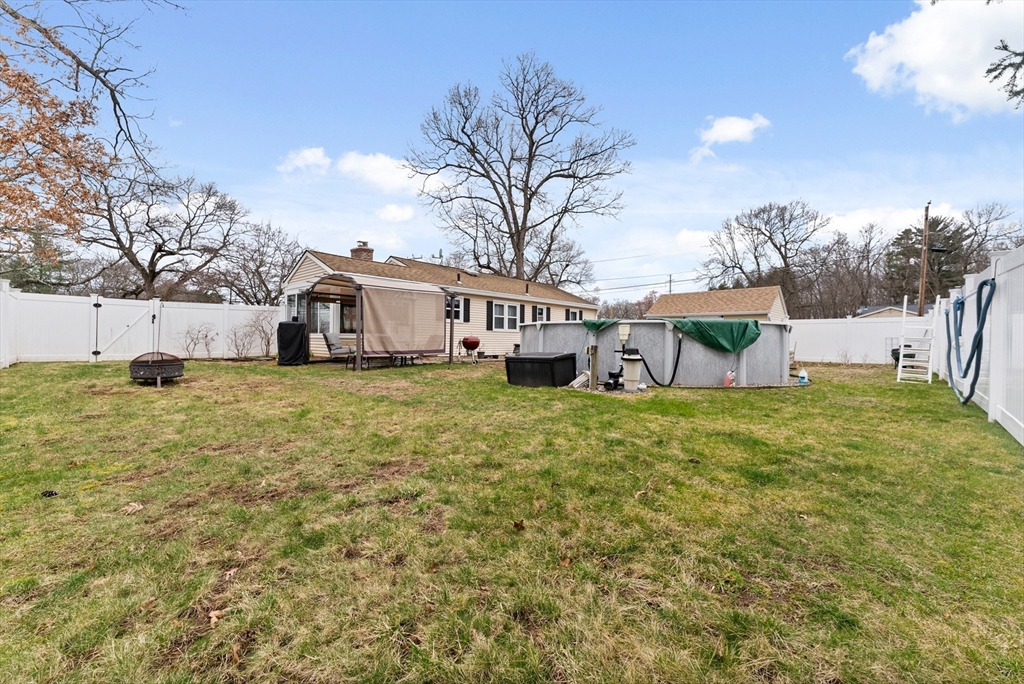 430 Amostown Road West Springfield, MA 01089 - Photo 40 of 41 a view of a house with a yard and sitting area