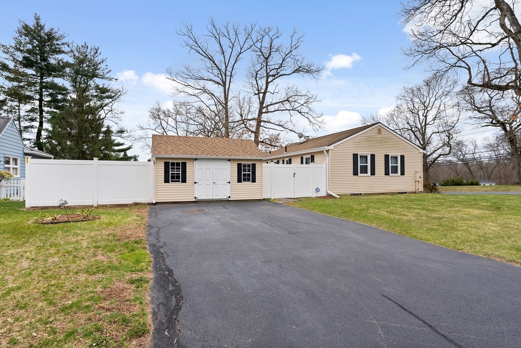 430 Amostown Road West Springfield, MA 01089 - Photo 41 of 41 a view of a house with backyard and trees