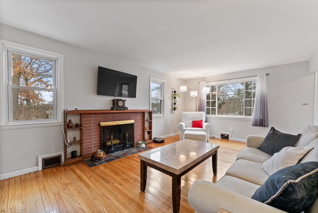 430 Amostown Road West Springfield, MA 01089 - Photo 5 of 41 a living room with furniture and a fireplace