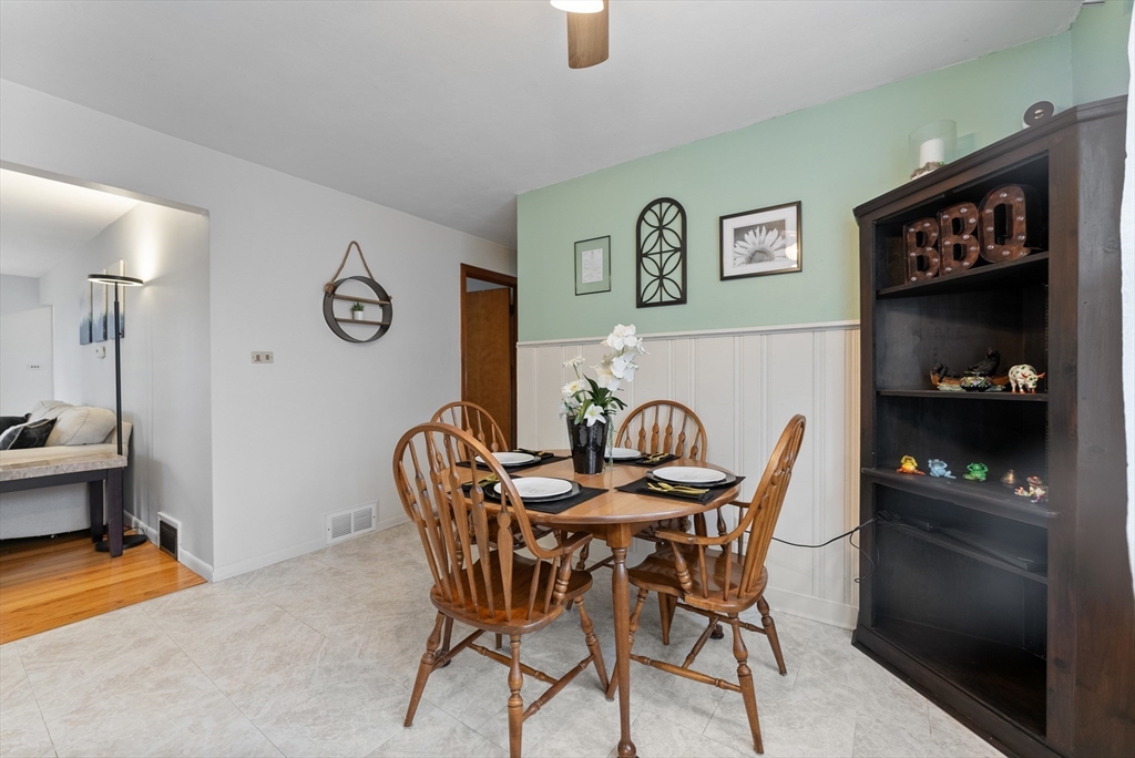 430 Amostown Road West Springfield, MA 01089 - Photo 8 of 41 a view of a table and chairs in a room